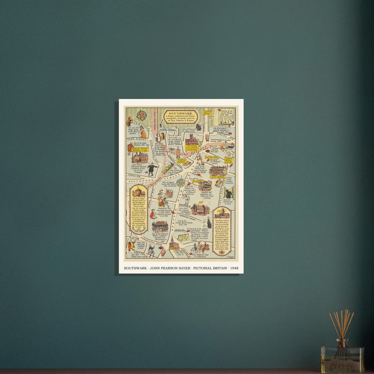 Vintage Southwark map print displayed on a dark green wall above a reed diffuser