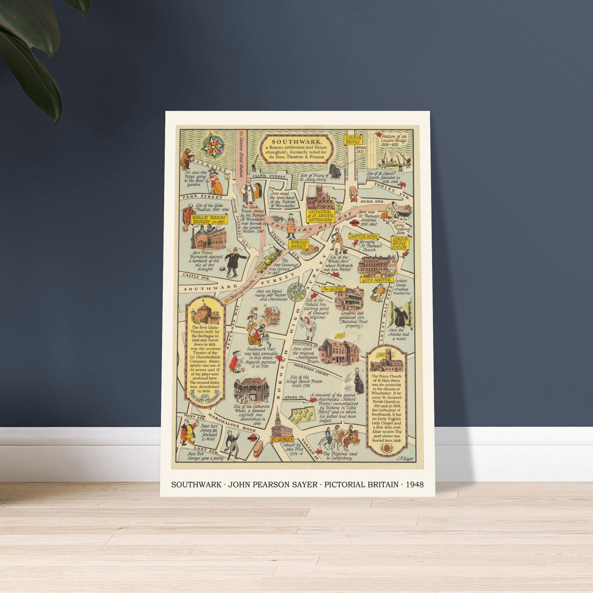 Vintage Southwark pictorial map print leaning against a deep blue wall